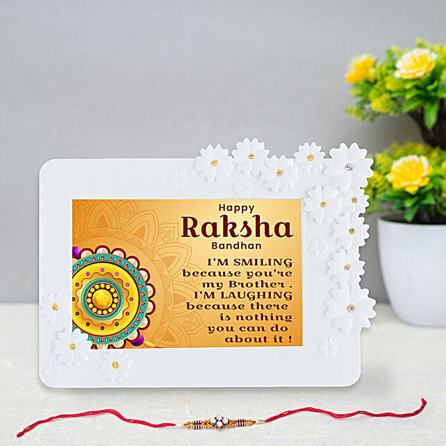Buy/Send Traditional Rakhi and Floral Frame Online- FNP