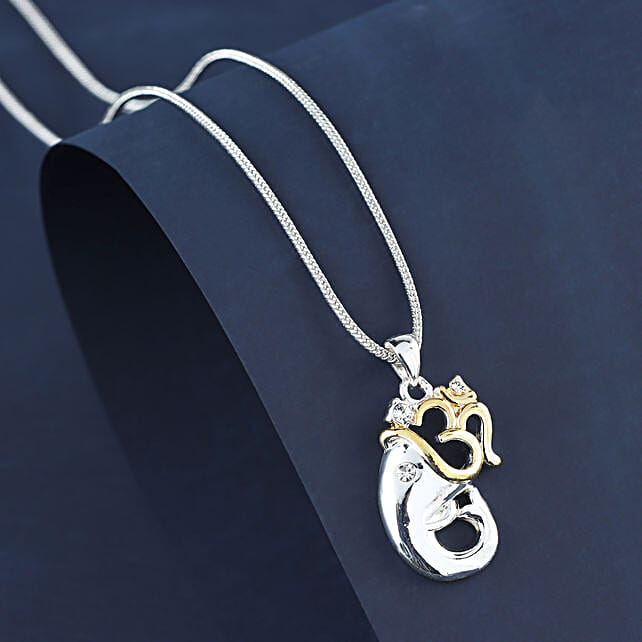 Buy/Send Gold Plated Ganesha Pendant Capsule Rakhi Online