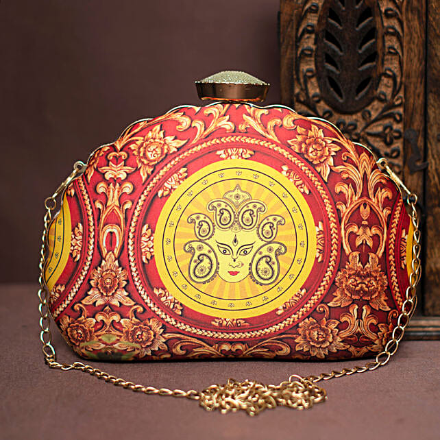 Buy/Send Vibrant Devi Clutch Online- FNP